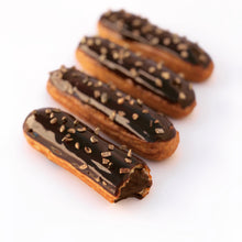 Load image into Gallery viewer, lined up chocolate eclairs
